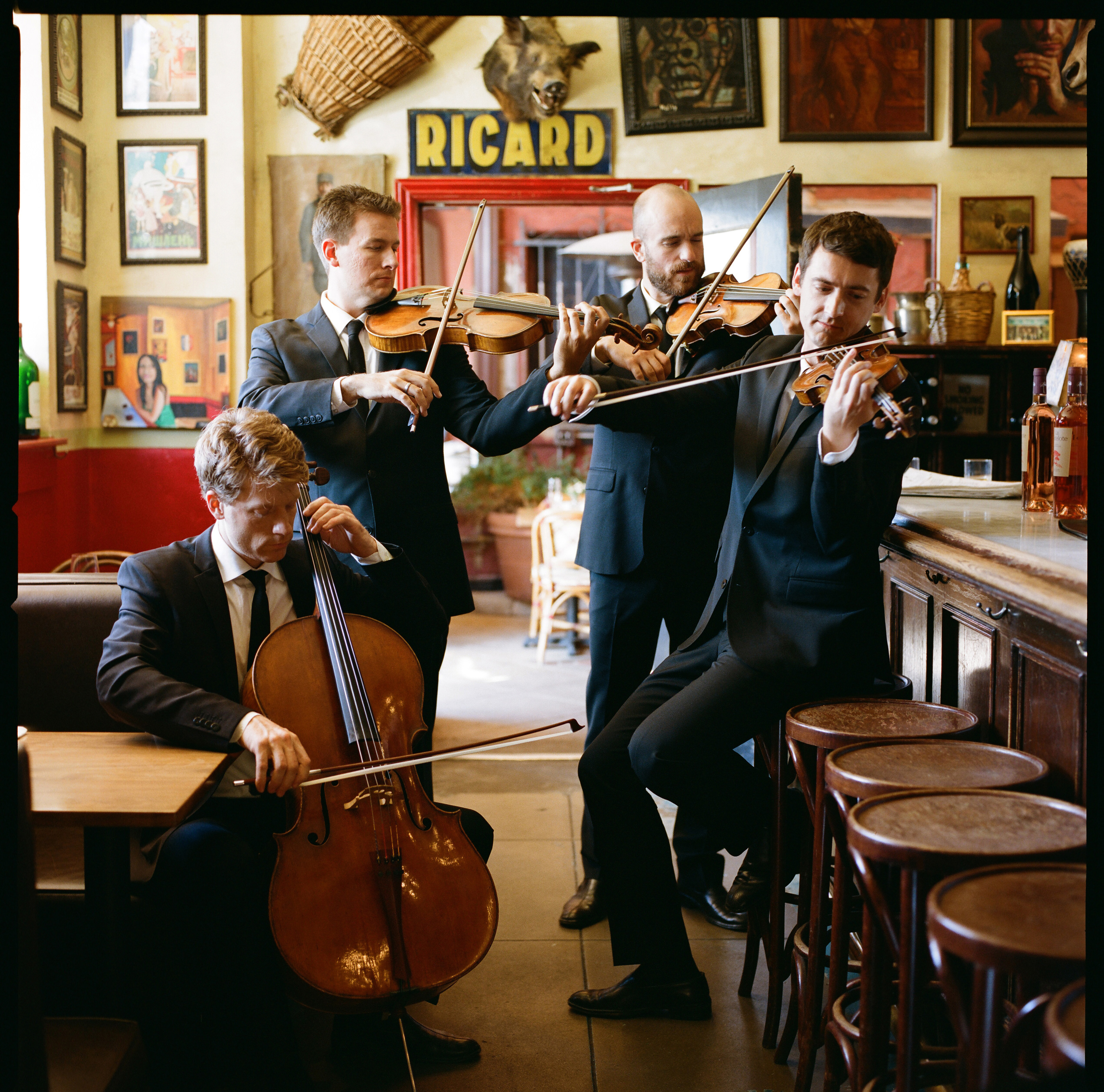 Calder Quartet playing in an empty restauraunt.